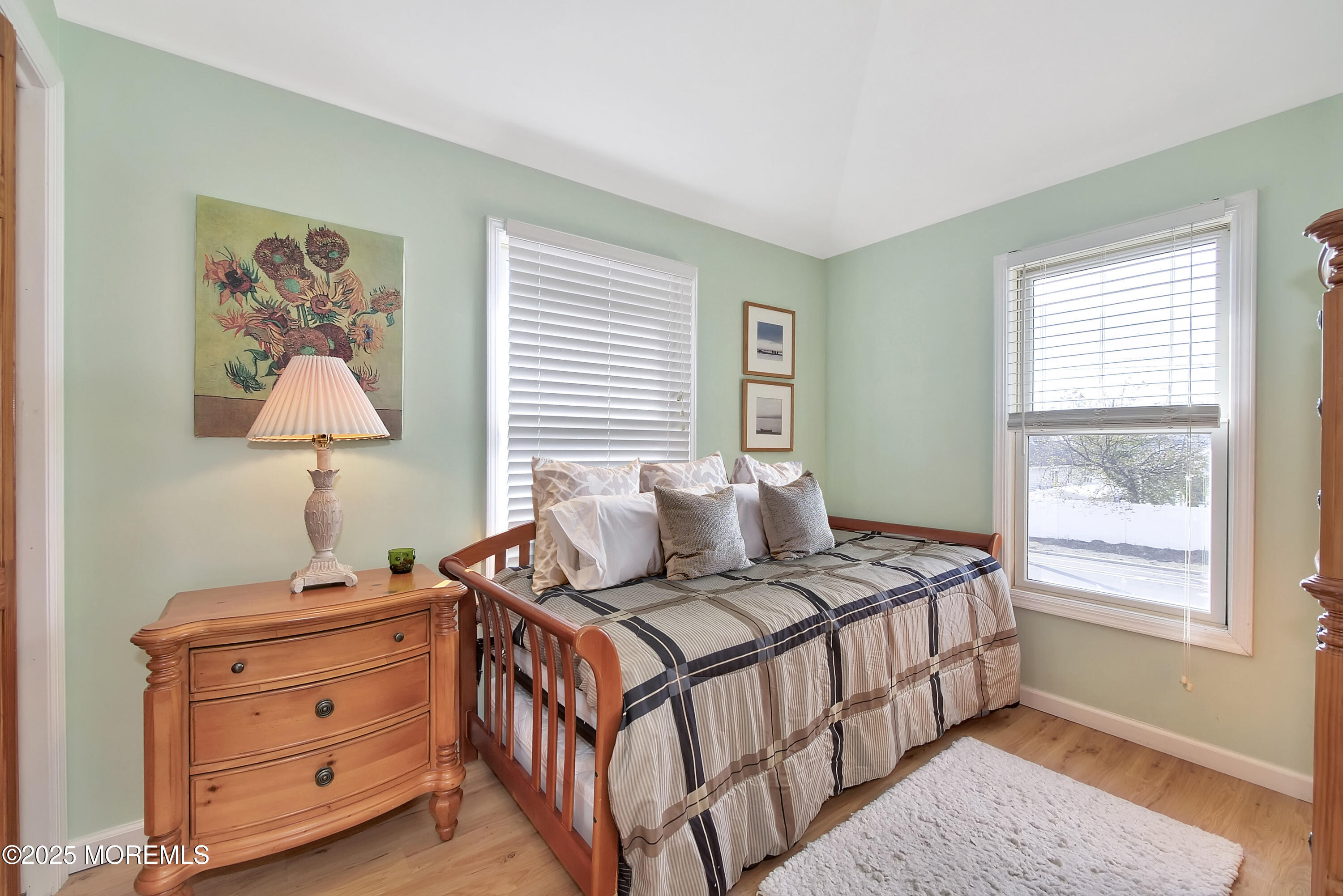 121 3rd Avenue Seaside Heights, NJ 08751 - Photo 19 of 20 a bedroom with a bed and a window