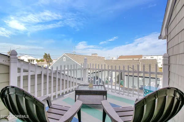a view of a chairs in balcony