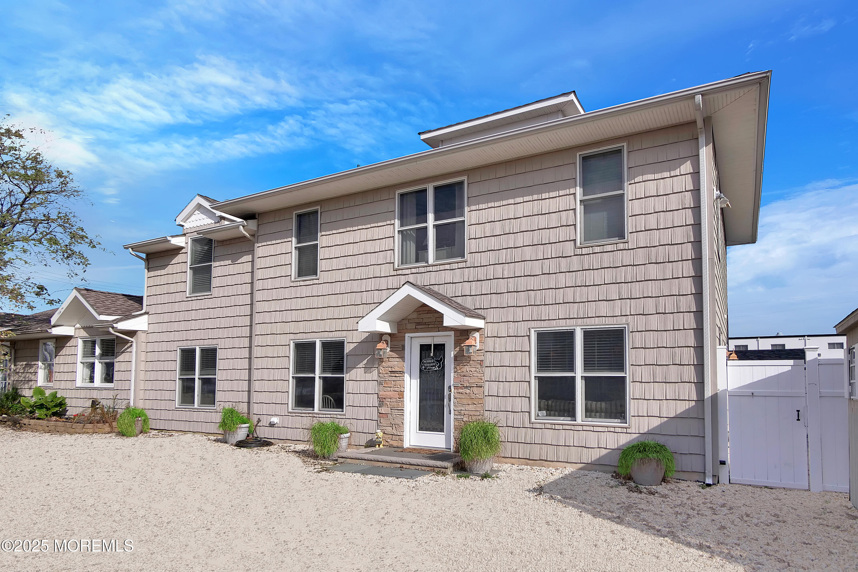 121 3rd Avenue Seaside Heights, NJ 08751 - Photo 9 of 20 a view of a house with a patio