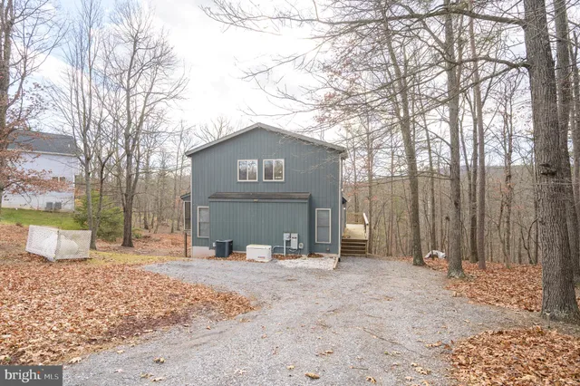 a view of balcony with wooden floor