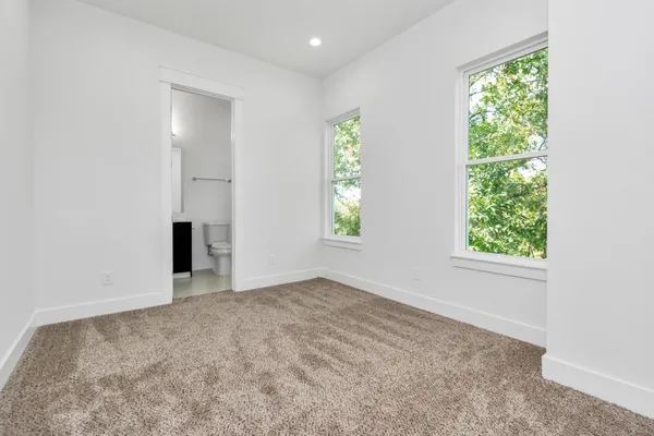 an empty room with windows