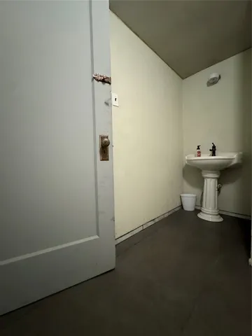a bathroom with a sink and a toilet