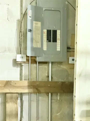 a view of a balcony with wooden floor