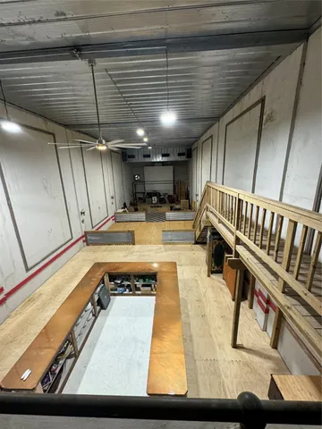 a view of swimming pool with furniture