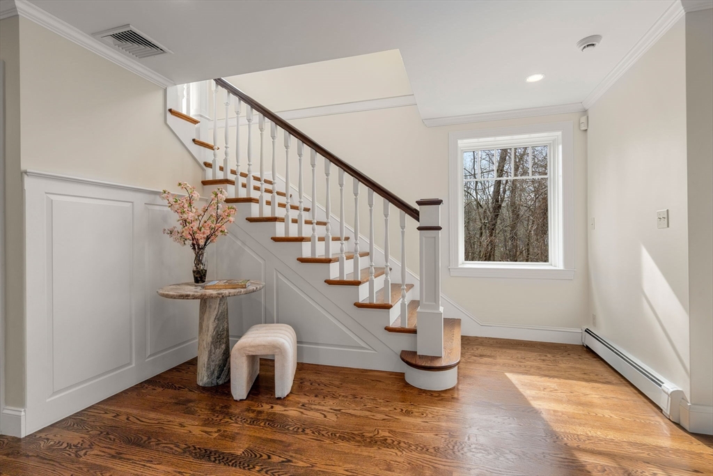 100 Oxford Road Westwood, MA 02090 - Photo 2 of 41 a view of entryway and hall with wooden floor