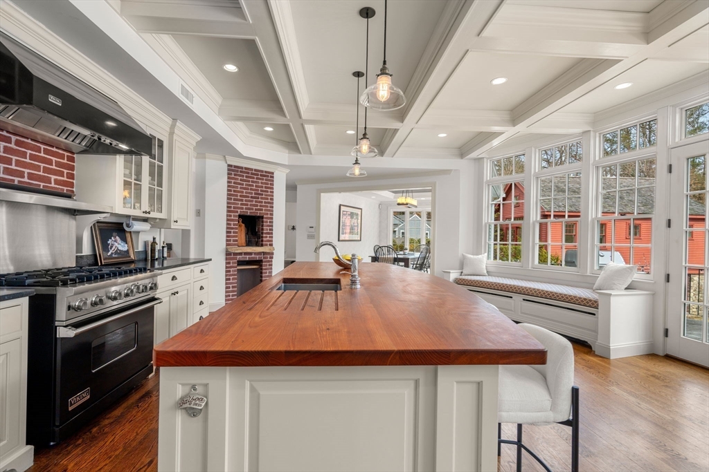 100 Oxford Road Westwood, MA 02090 - Photo 6 of 41 a kitchen with stainless steel appliances granite countertop a stove and a refrigerator