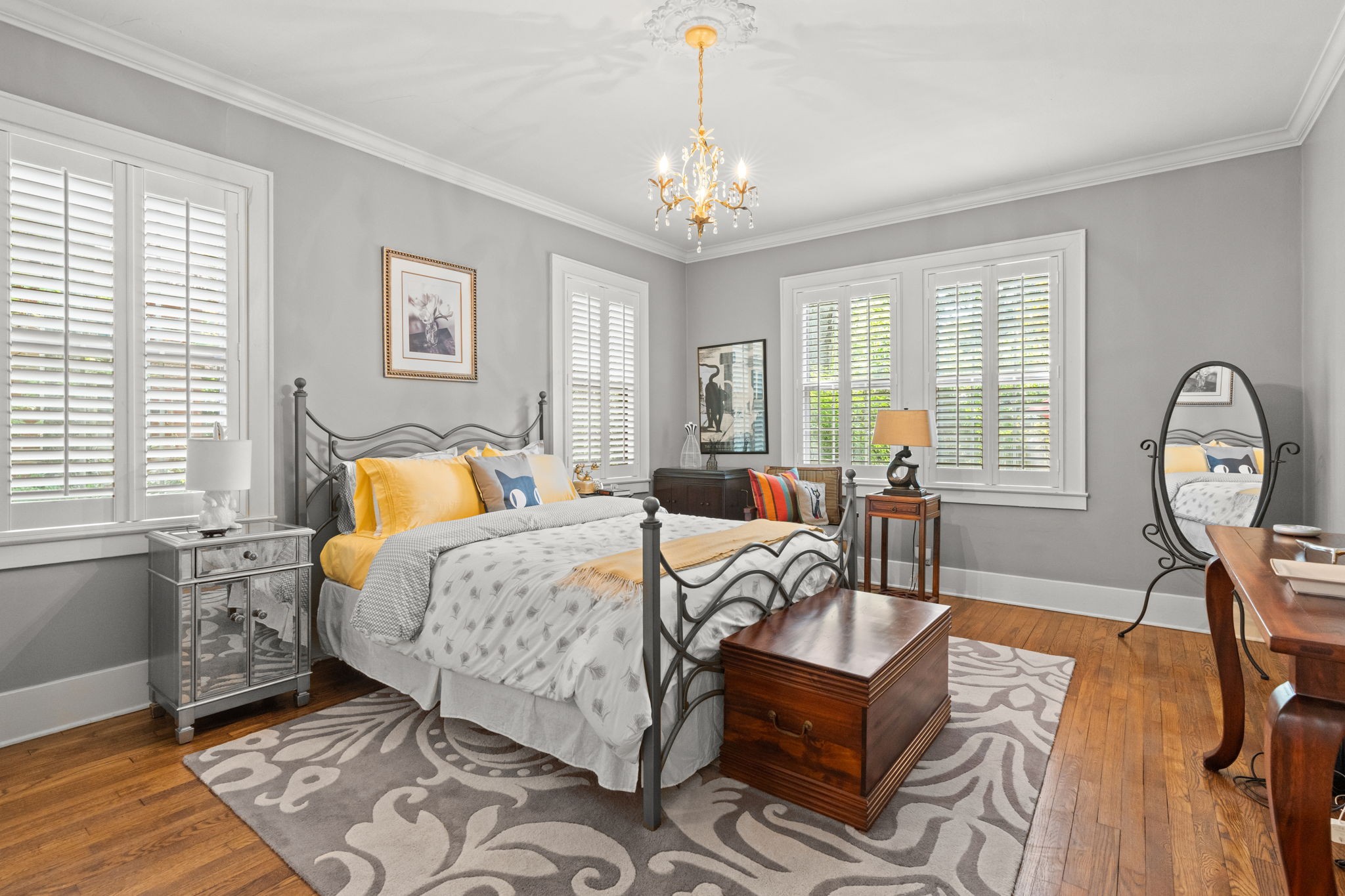 4117 Aberdeen Road Nashville, TN 37205 - Photo 18 of 46 a bedroom with a bed a chandelier and a dresser