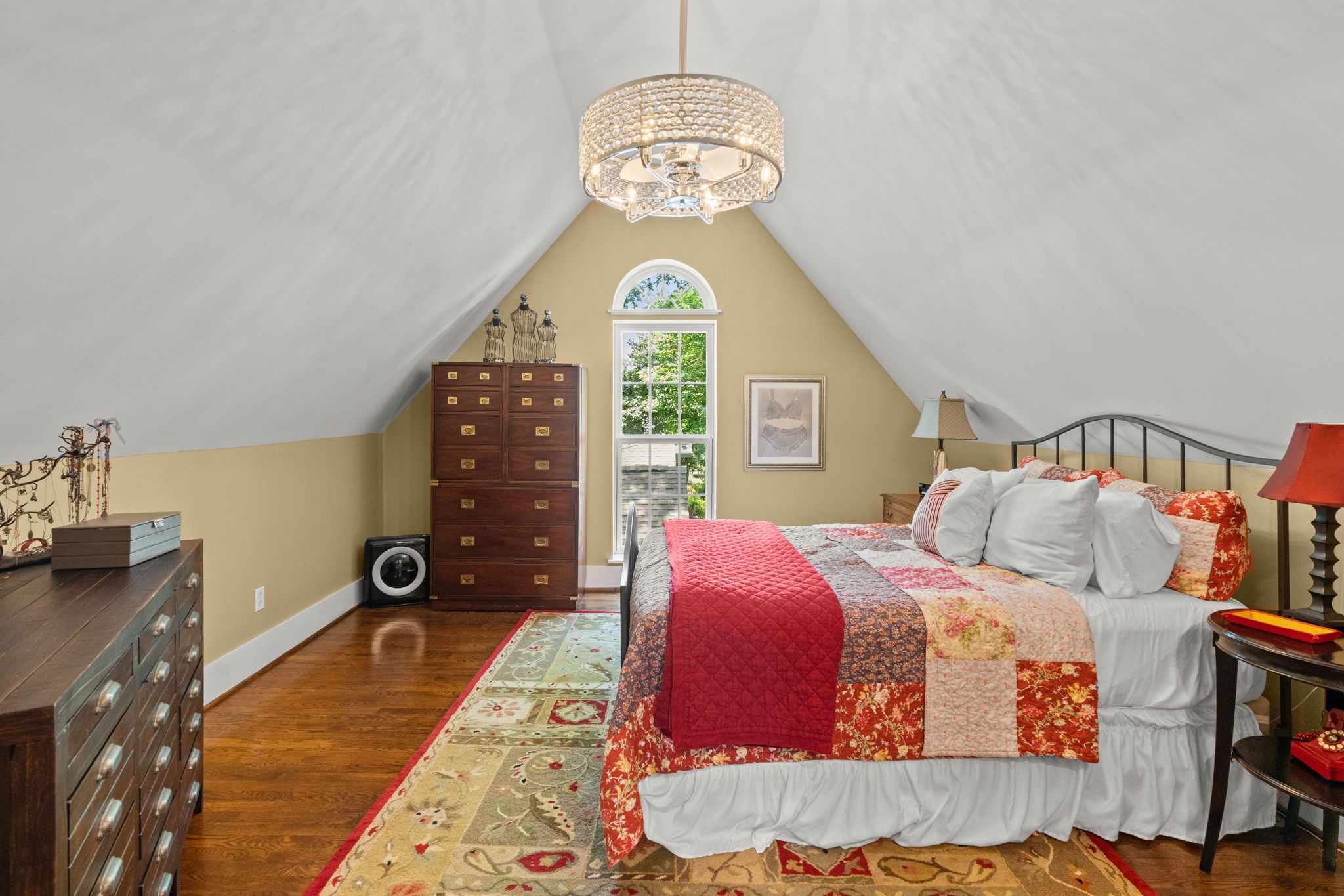 4117 Aberdeen Road Nashville, TN 37205 - Photo 30 of 46 a bedroom with a bed and a chandelier