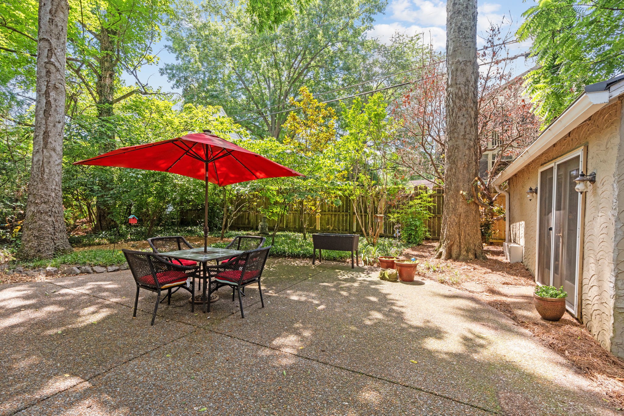 4117 Aberdeen Road Nashville, TN 37205 - Photo 39 of 46 a view of a house with backyard sitting area and furniture