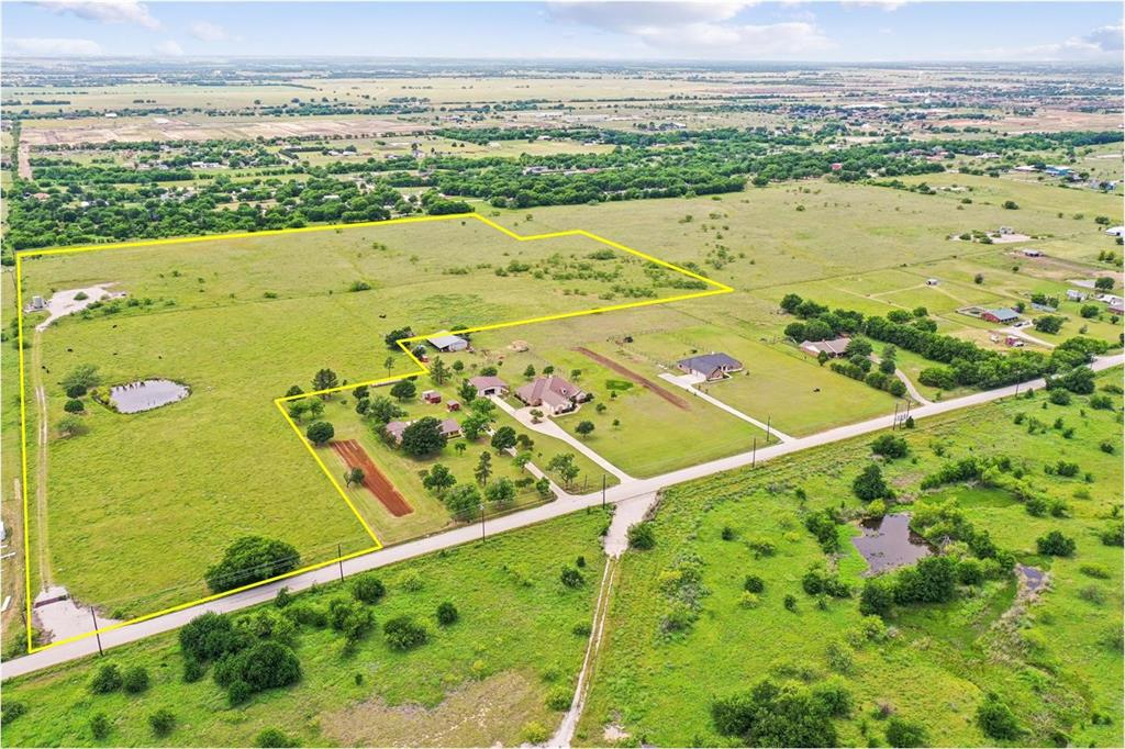 Tbd Florance Road Ponder, TX 76259 - Photo 1 of 8 Expansive property featuring a private pond, open green spaces, scattered mature trees, and direct road frontage