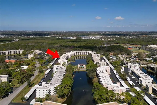a view of a street with cars