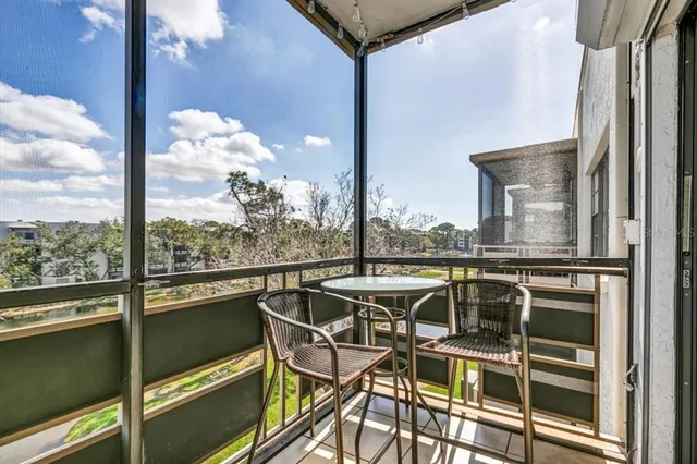 a view of a lake from a balcony