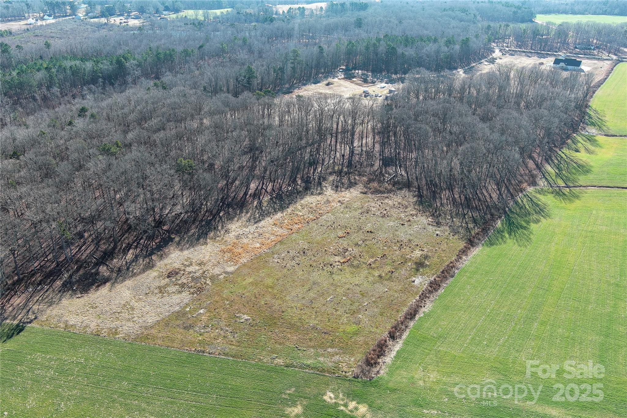 5821 Stack Road Monroe, NC 28112 - Photo 1 of 15 a view of a yard with large trees