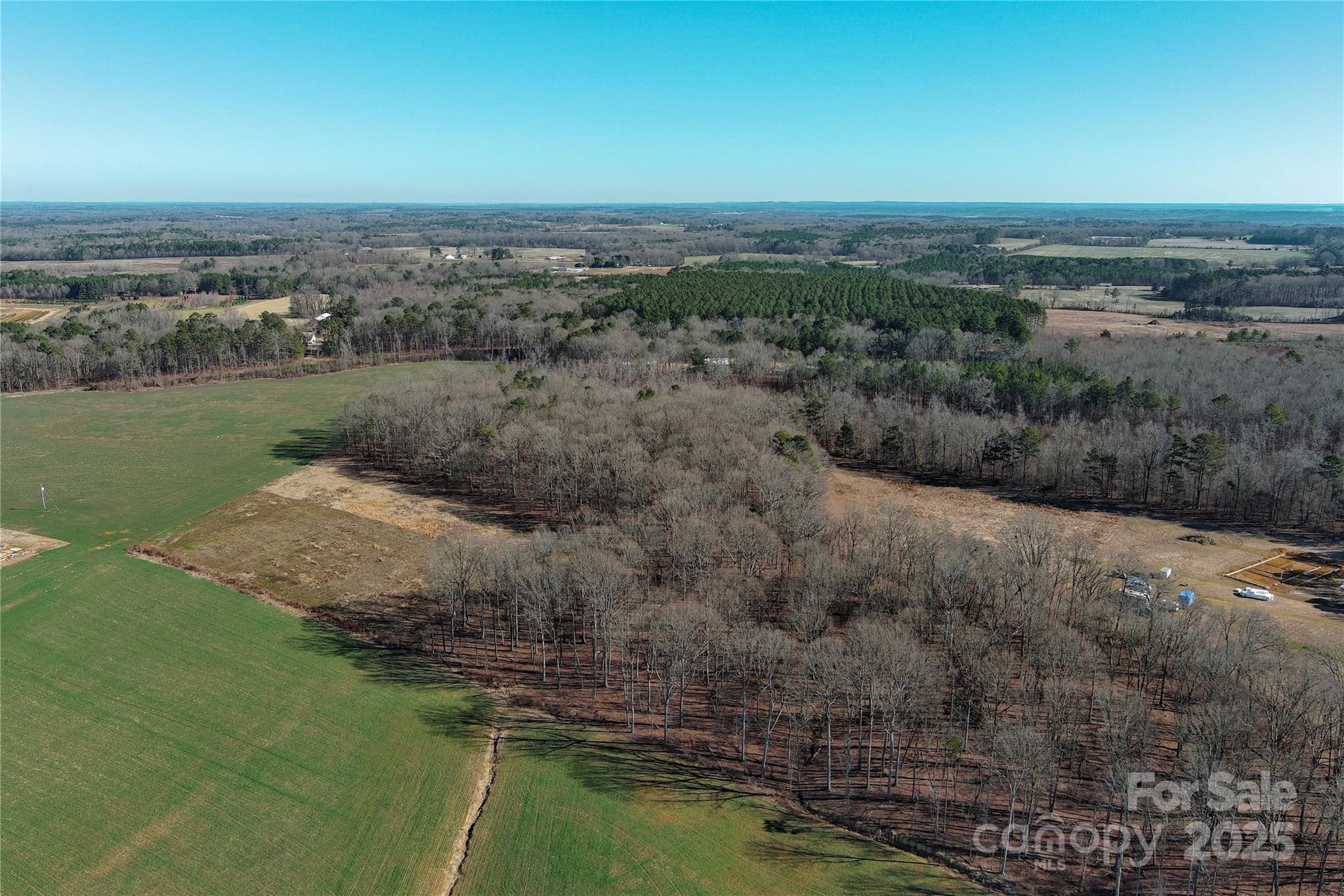 5821 Stack Road Monroe, NC 28112 - Photo 15 of 15 a view of a lake with a city