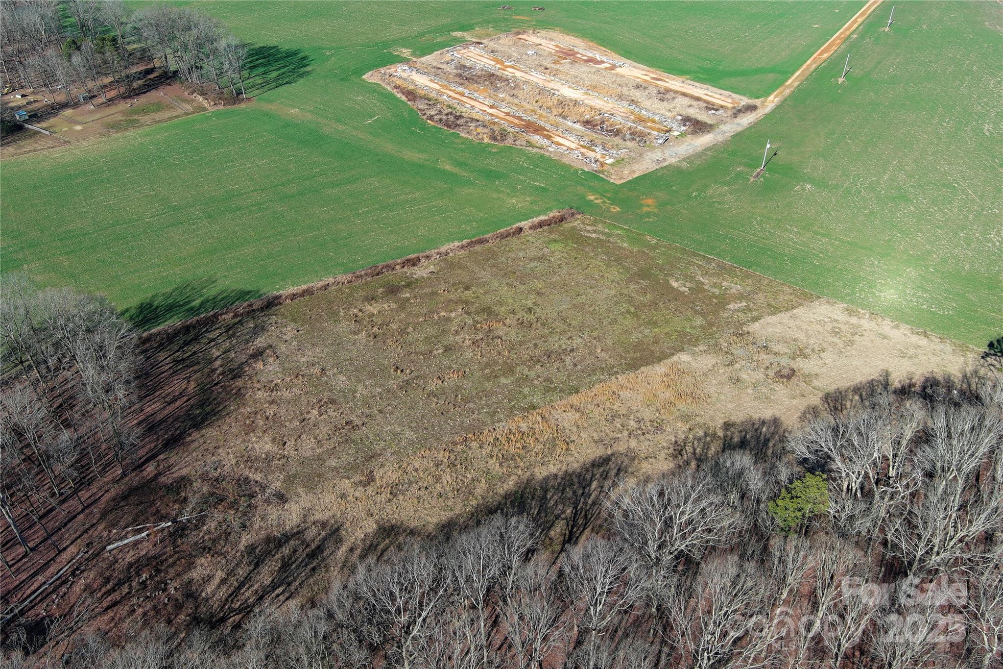 5821 Stack Road Monroe, NC 28112 - Photo 2 of 15 a view of a field with a field