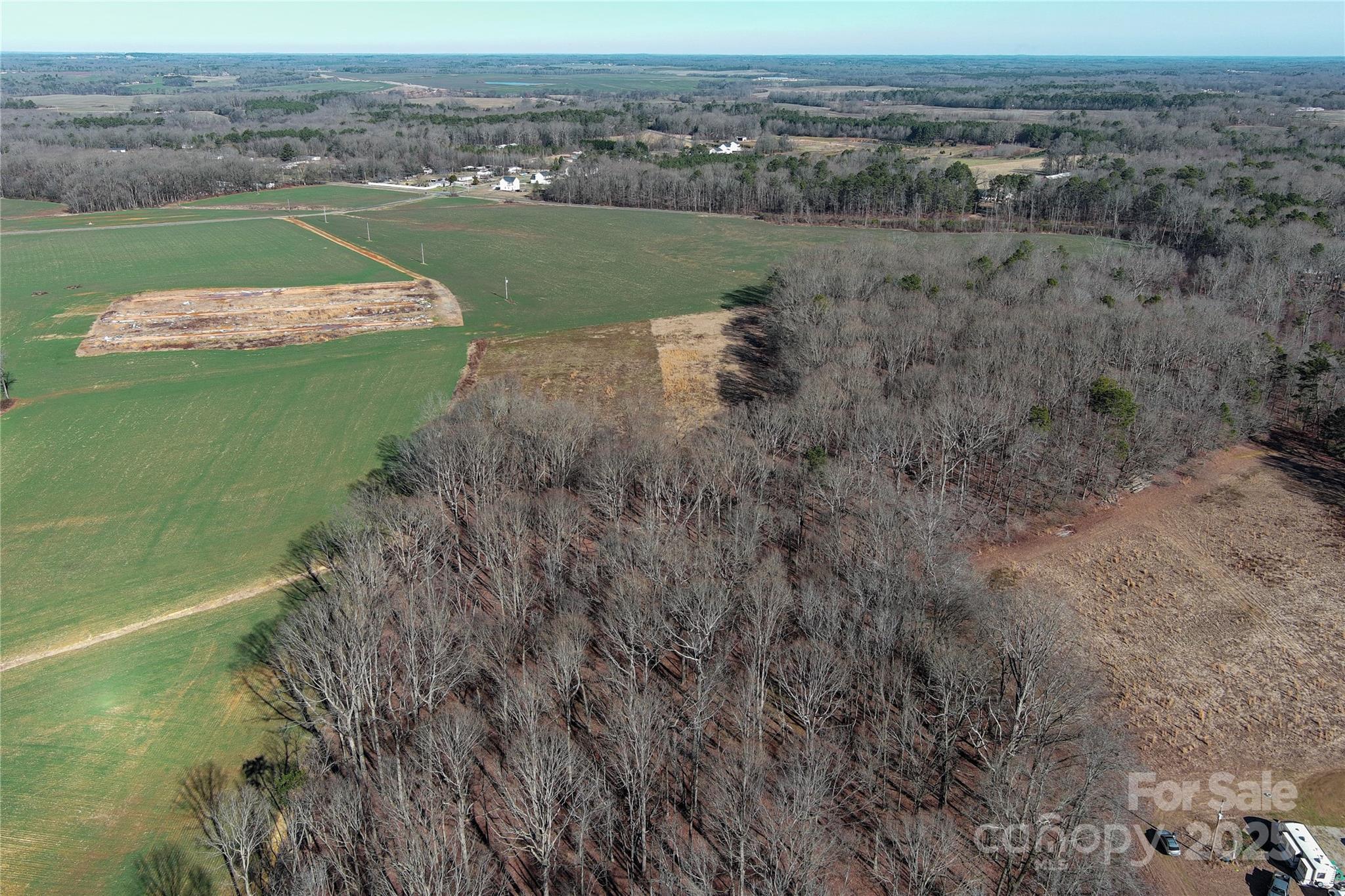 5821 Stack Road Monroe, NC 28112 - Photo 10 of 15 a view of a grassy area with an ocean