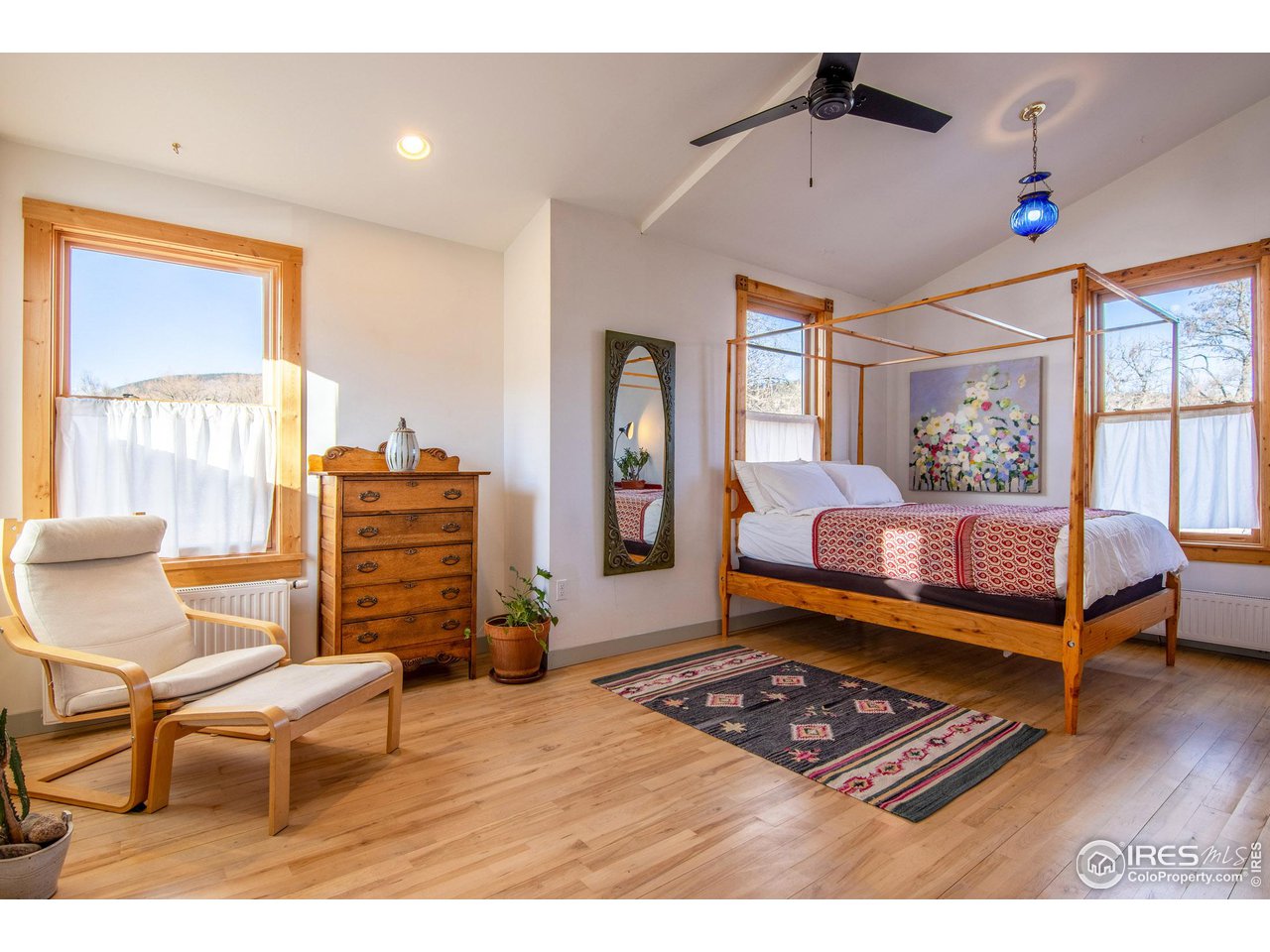 426 Park Street Lyons, CO 80540 - Photo 14 of 40 a bedroom with furniture and window