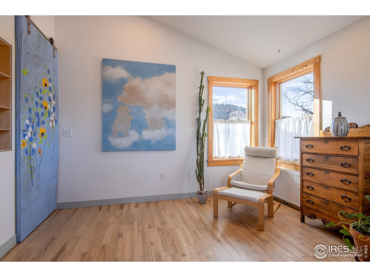 426 Park Street Lyons, CO 80540 - Photo 15 of 40 a living room with furniture and a large window