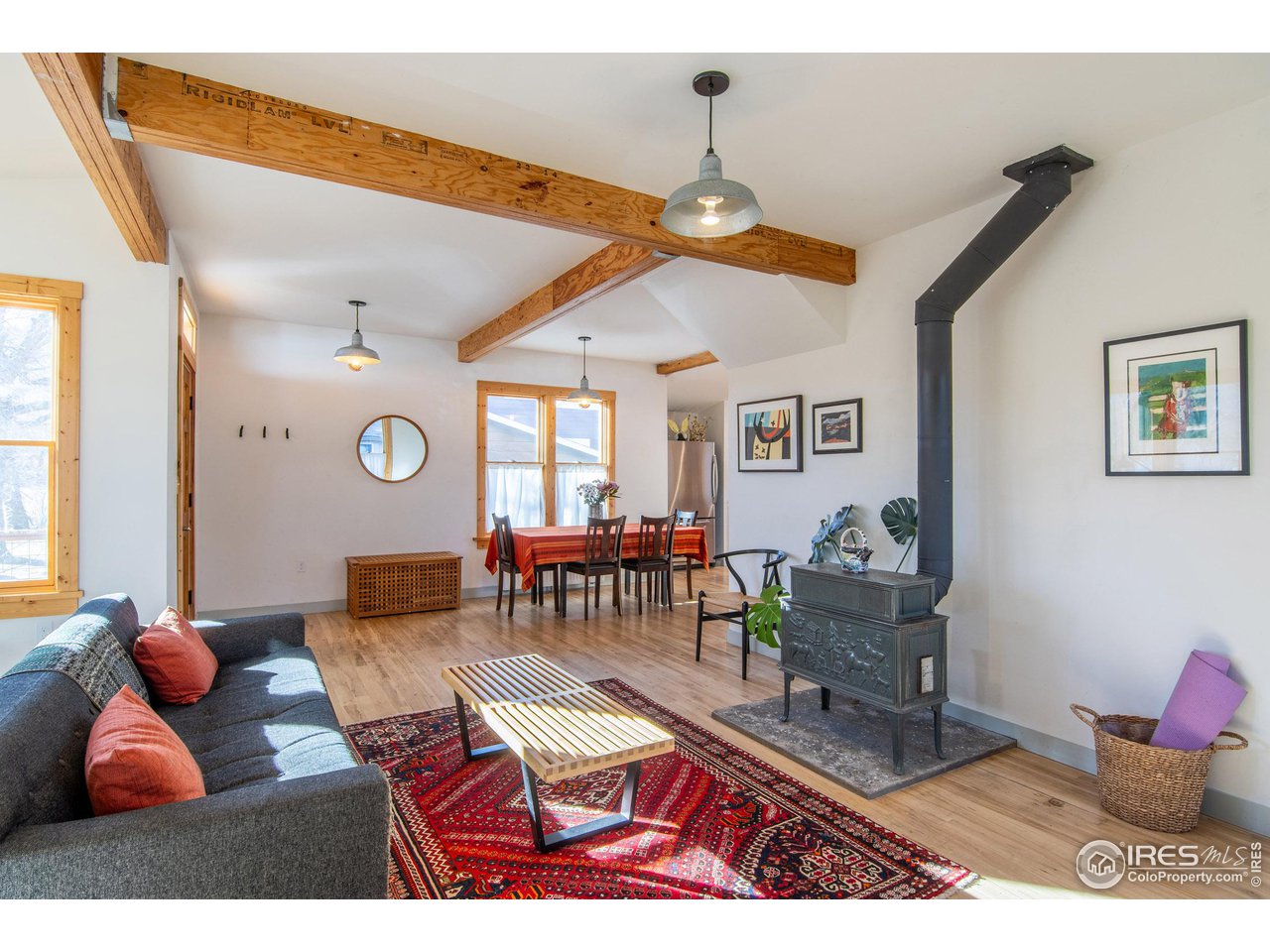 426 Park Street Lyons, CO 80540 - Photo 2 of 40 a living room with furniture a rug and a window