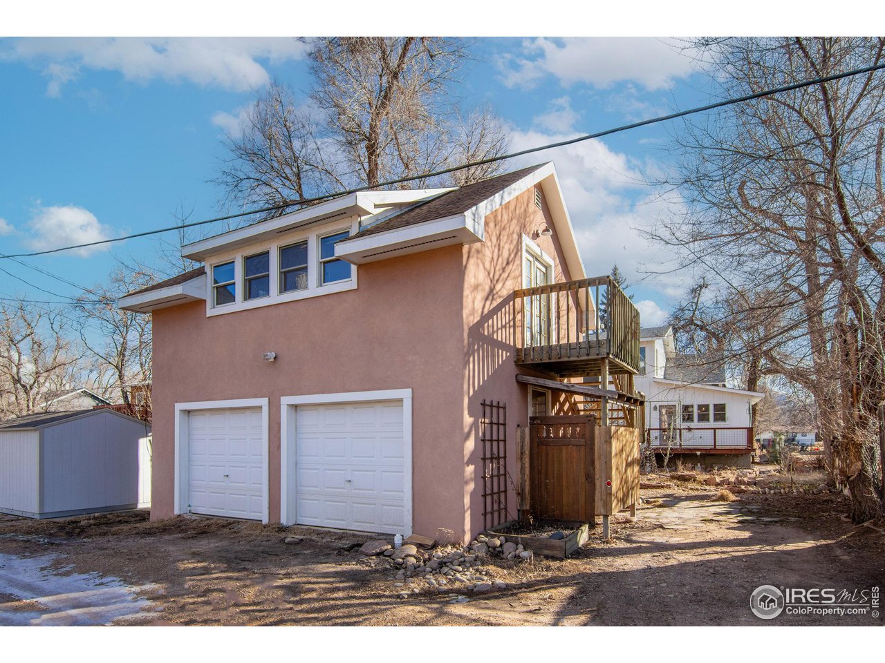 426 Park Street Lyons, CO 80540 - Photo 28 of 40 a front view of a house with a garden
