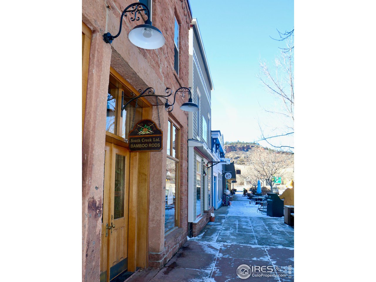 426 Park Street Lyons, CO 80540 - Photo 38 of 40 a view of a hallway with a flower pot