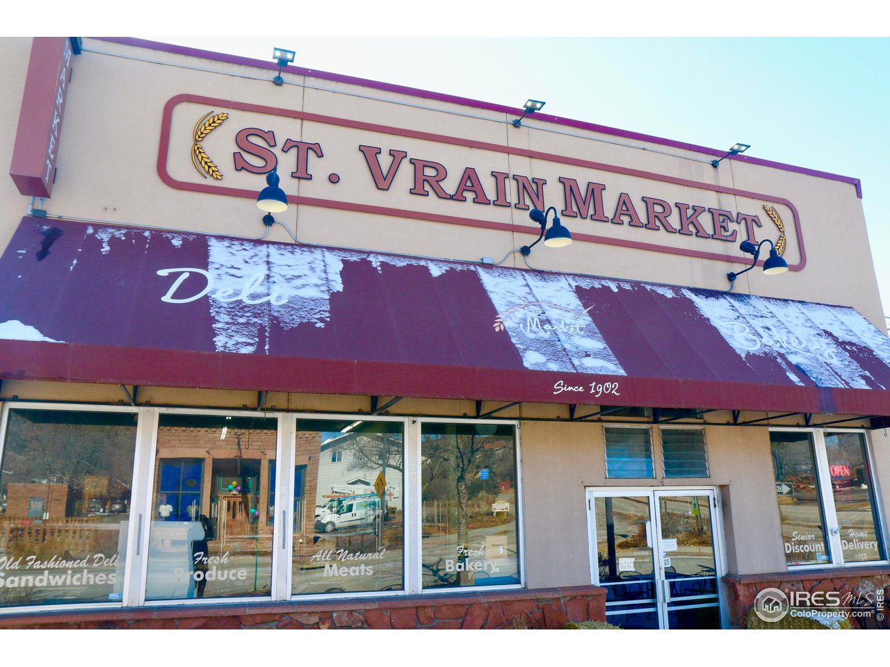 426 Park Street Lyons, CO 80540 - Photo 39 of 40 a front view of multi story building with retail shops