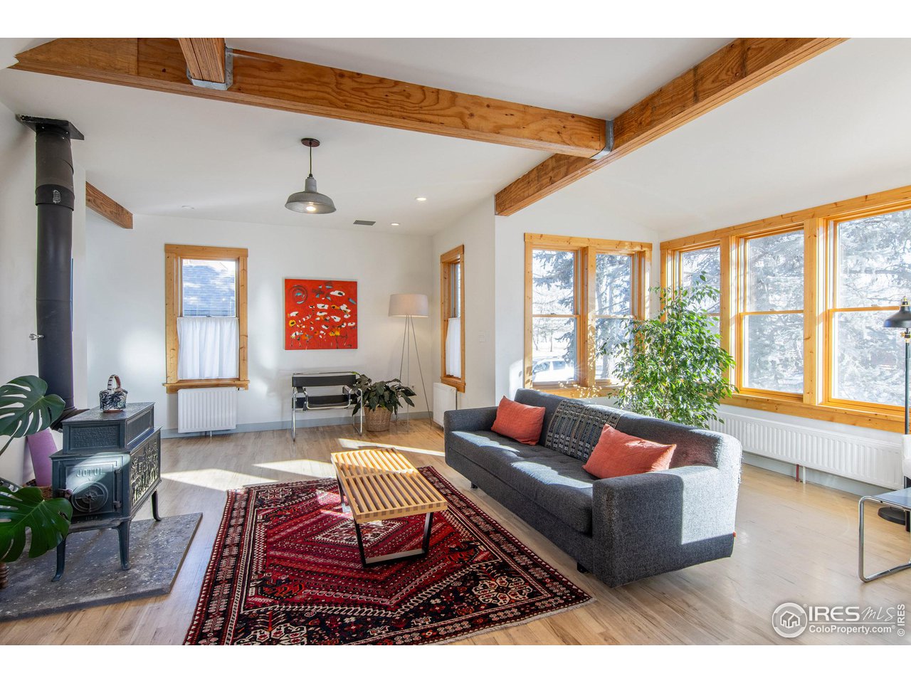 426 Park Street Lyons, CO 80540 - Photo 7 of 40 a living room with furniture a rug and a large window