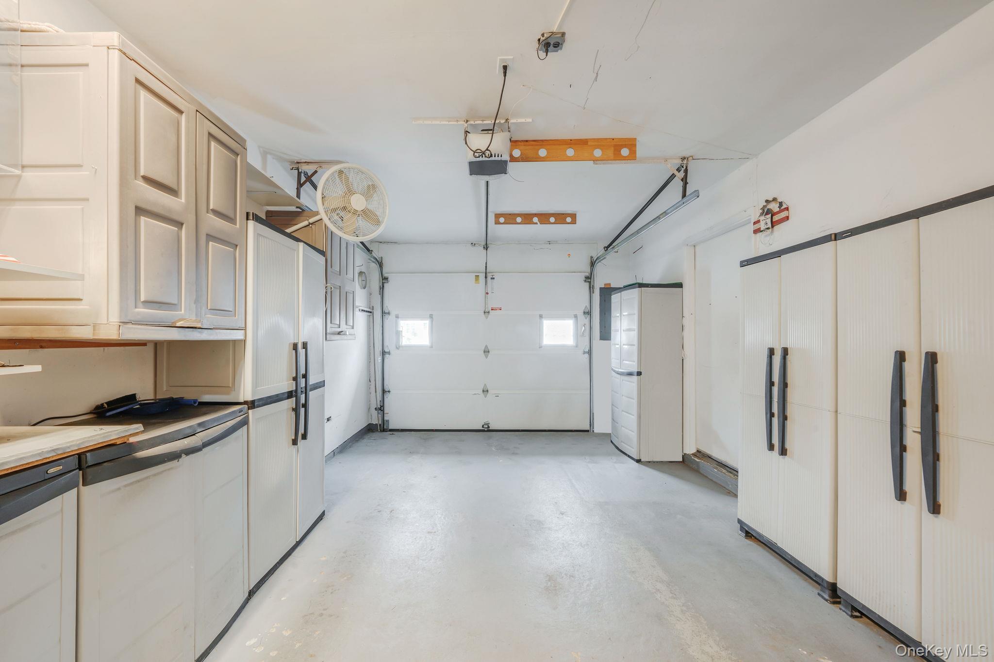 61 Enfield Court, Unit B Ridge, NY 11961 - Photo 32 of 32 a view of a storage & utility room