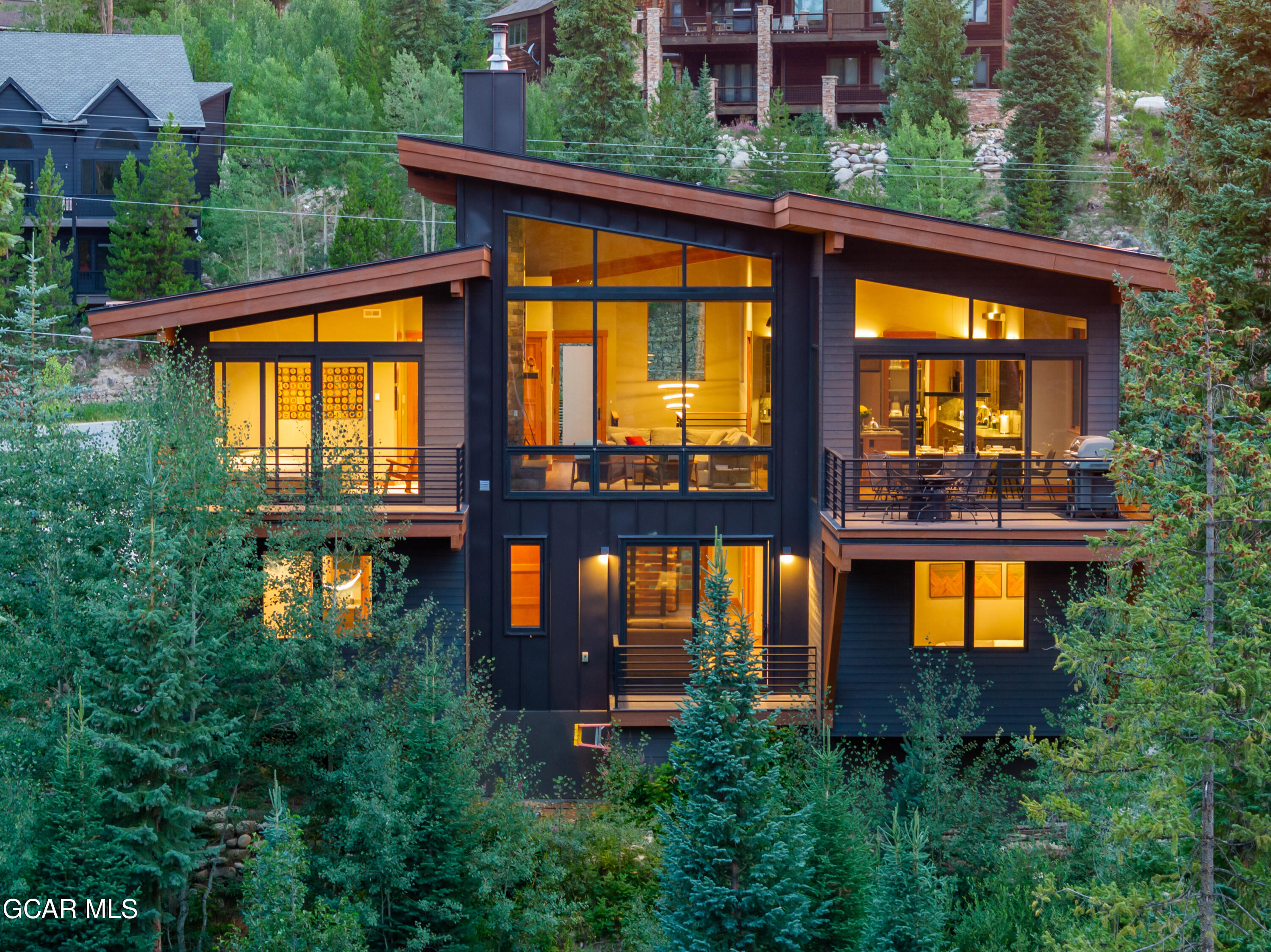684 Vasquez Road Winter Park, CO 80482 - Photo 1 of 45 front view of a house with a swimming pool