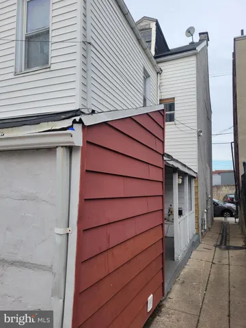 a view of front door and a window