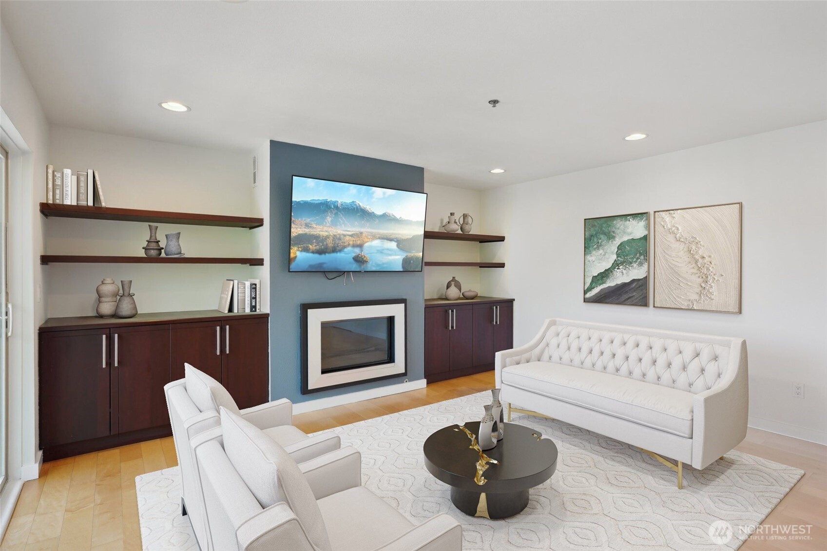 a living room with furniture a fireplace and a flat screen tv