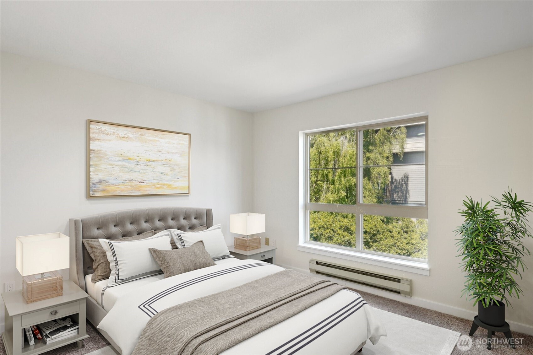 701 Galer Street, Unit 504 Seattle, WA 98109 - Photo 12 of 28 a bedroom with bed and a large window