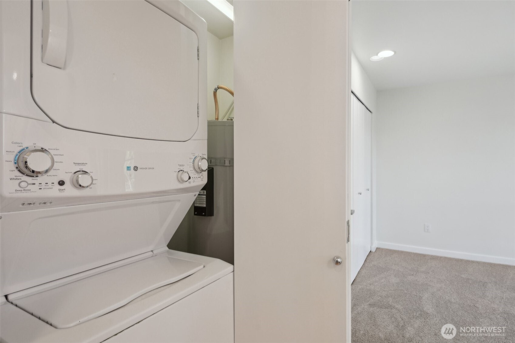 701 Galer Street, Unit 504 Seattle, WA 98109 - Photo 16 of 28 a utility room with dryer and washer
