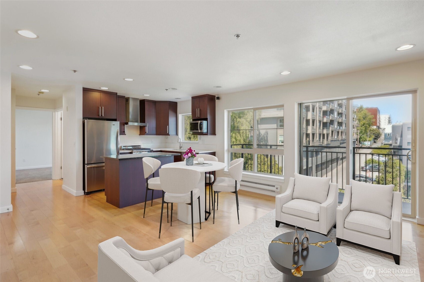 701 Galer Street, Unit 504 Seattle, WA 98109 - Photo 4 of 28 a living room with furniture and a large window