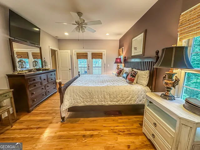 a bathroom with a sink a mirror and a shower