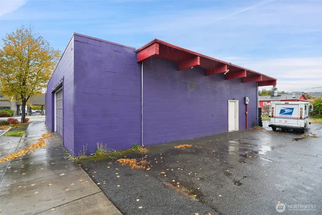 a view of a street with cars on road