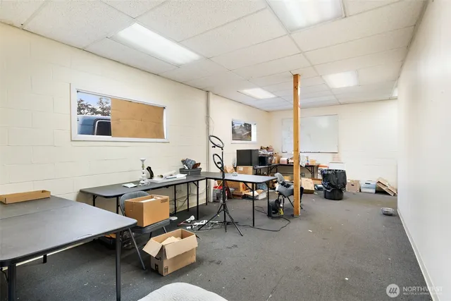 a room with furniture and a view of living room