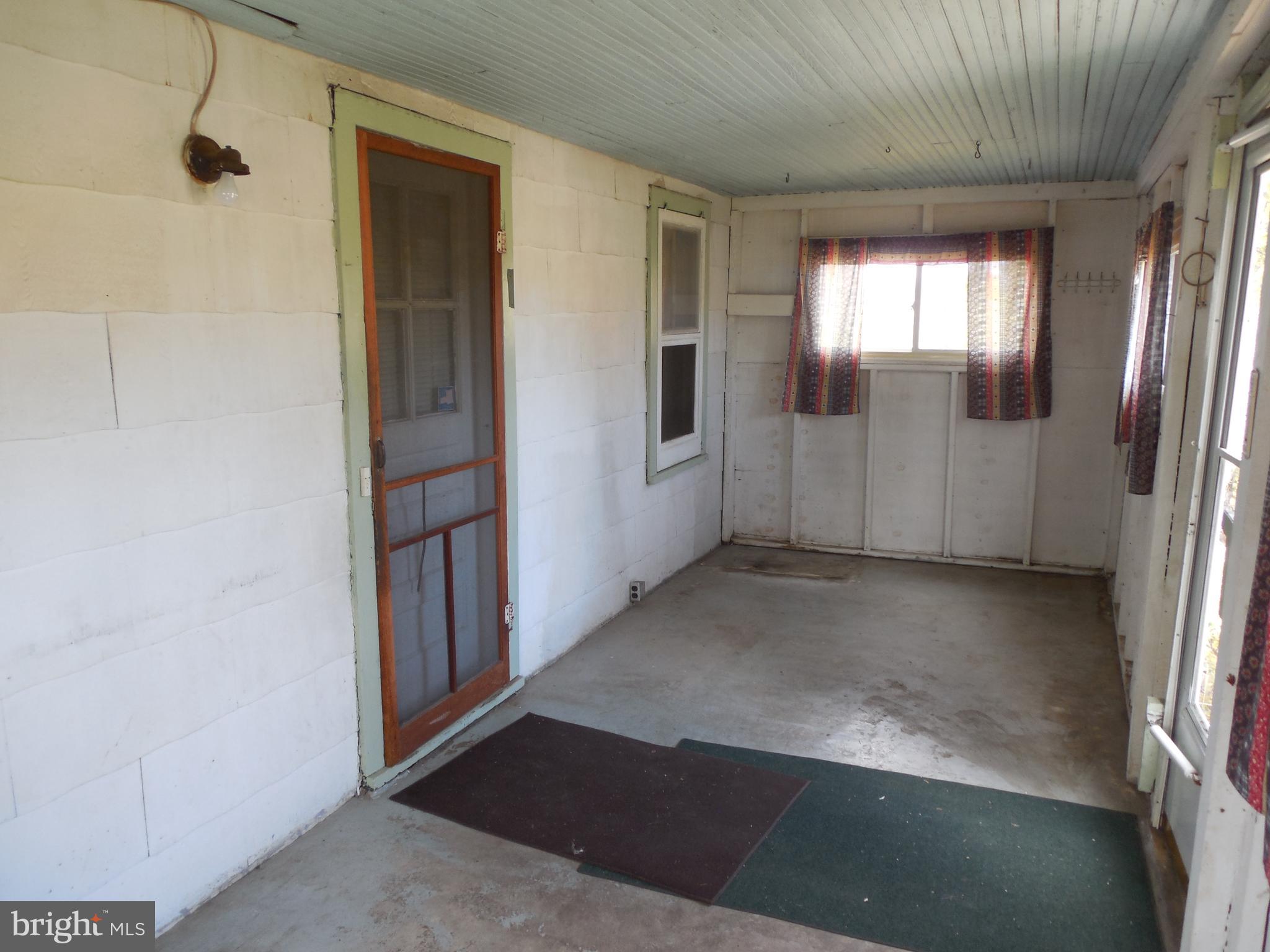 11400 Tippett Road Clinton, MD 20735 - Photo 7 of 36 Enclosed rear porch
