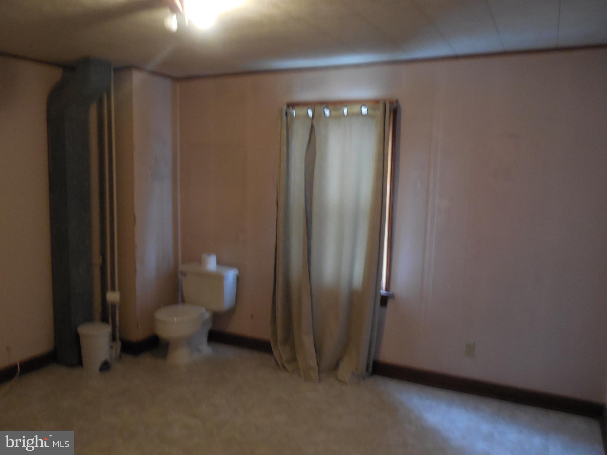 11400 Tippett Road Clinton, MD 20735 - Photo 8 of 36 First Bedroom main floor with plumbing