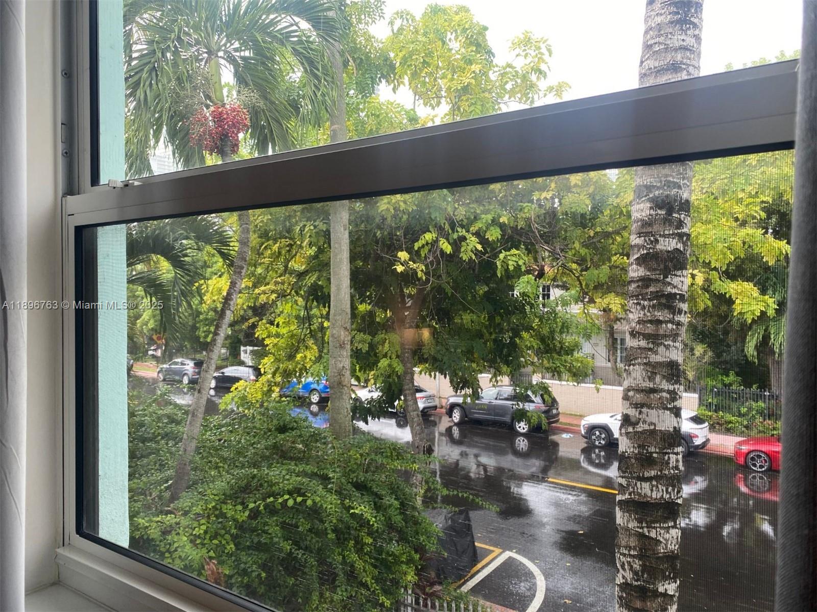 753 Michigan Avenue, Unit 2B Miami Beach, FL 33139 - Photo 22 of 22 a view of yard from balcony