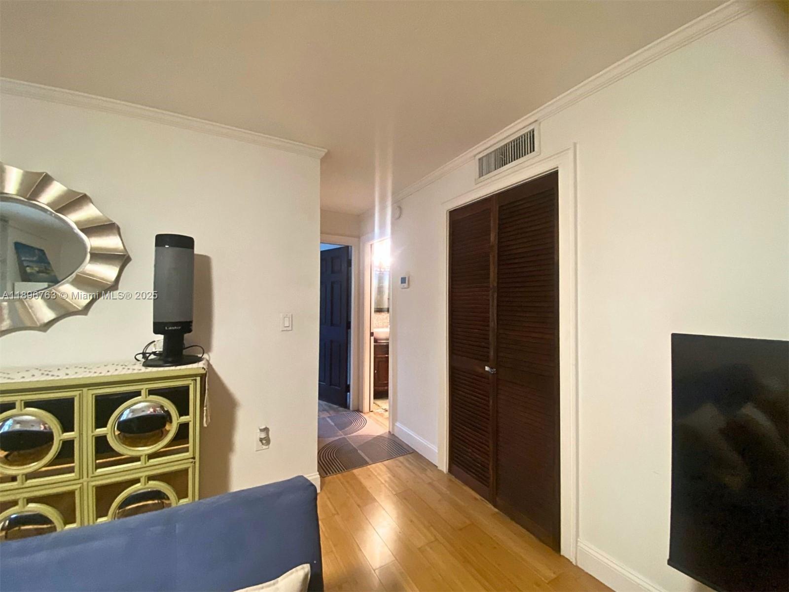 753 Michigan Avenue, Unit 2B Miami Beach, FL 33139 - Photo 10 of 22 view of living room with furniture and a window