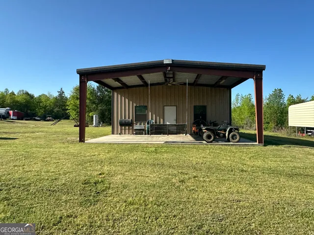 a view of a swimming pool with a patio