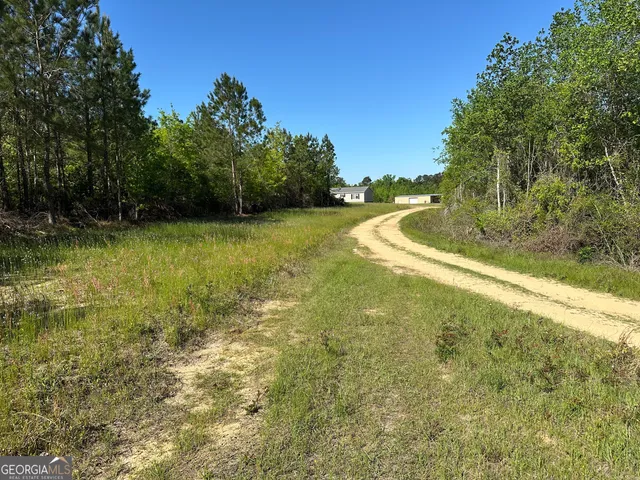 a view of outdoor space and yard