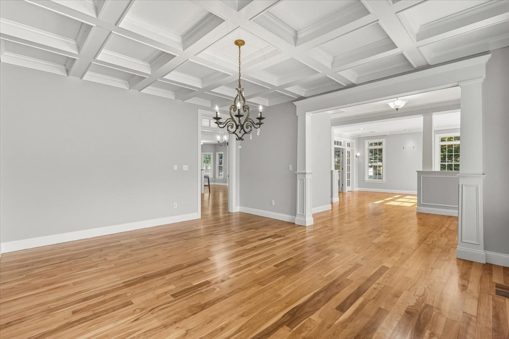 118 Bates Way Hanover, MA 02339 - Photo 9 of 42 a view of a room with wooden floor chandelier and entryway
