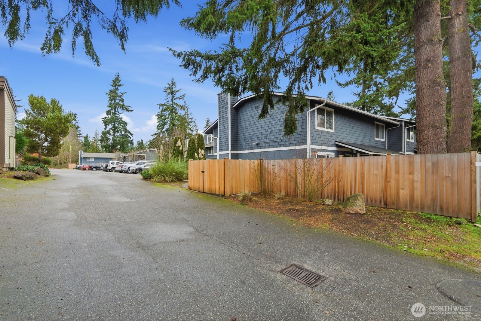 7431 212th Street Southwest, Unit 16 Edmonds, WA 98026 - Photo 18 of 22 a backyard of a house with lots of green space