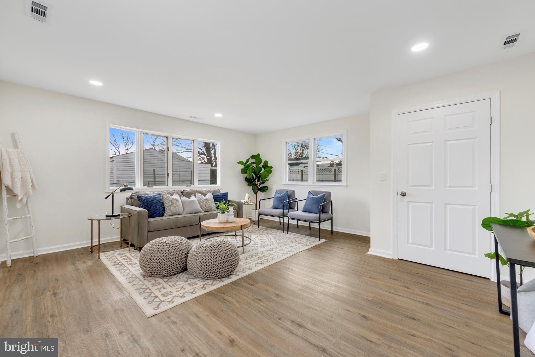 723 Cotter Road Glen Burnie, MD 21060 - Photo 14 of 31 a living room with furniture and a wooden floor