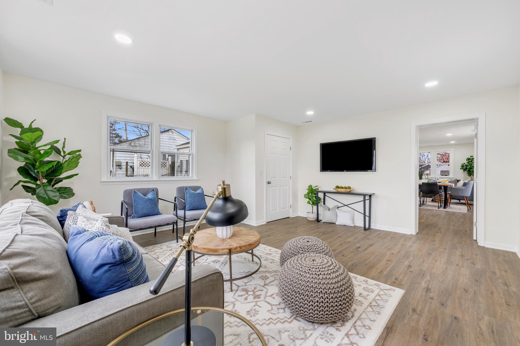 723 Cotter Road Glen Burnie, MD 21060 - Photo 17 of 31 a living room with furniture and a flat screen tv