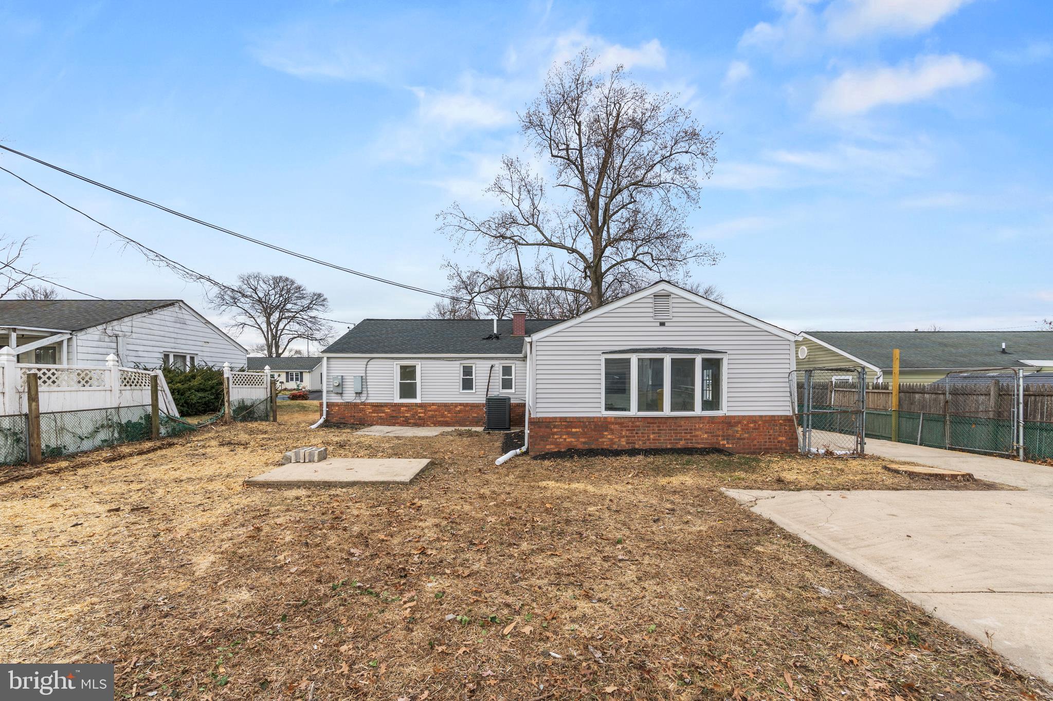 723 Cotter Road Glen Burnie, MD 21060 - Photo 31 of 31 a front view of a house with a yard