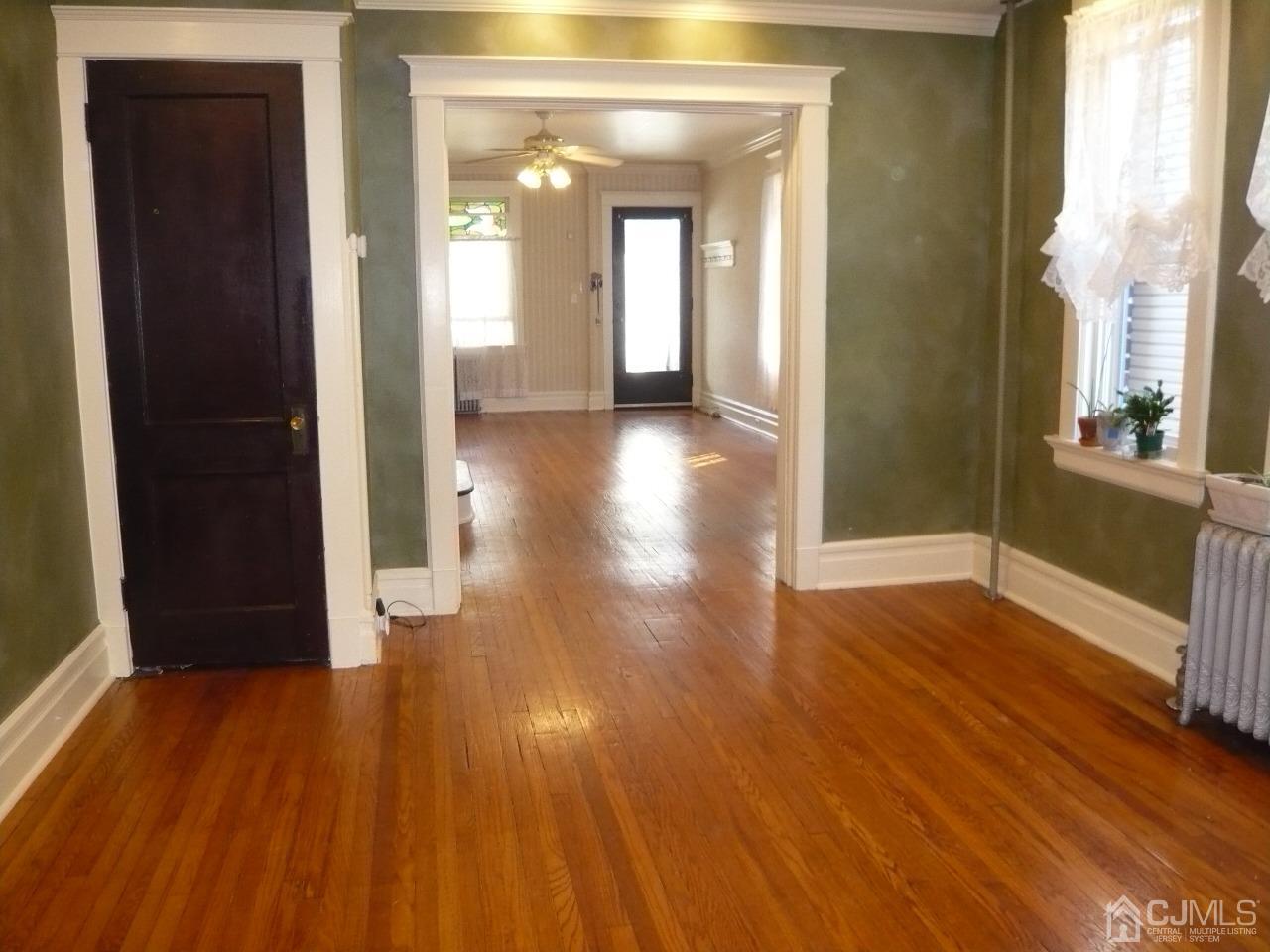 232 Rector Street Perth Amboy, NJ 08861 - Photo 11 of 31 a view of gallery with wooden floor