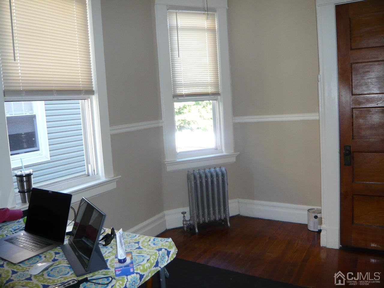 232 Rector Street Perth Amboy, NJ 08861 - Photo 27 of 31 a room with furniture and window